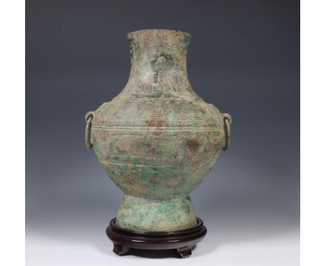 China, archaic bronze wine vessel, 'hu', Spring and Autumn period (770-476 BC), the swelling sides incised with geometrical p