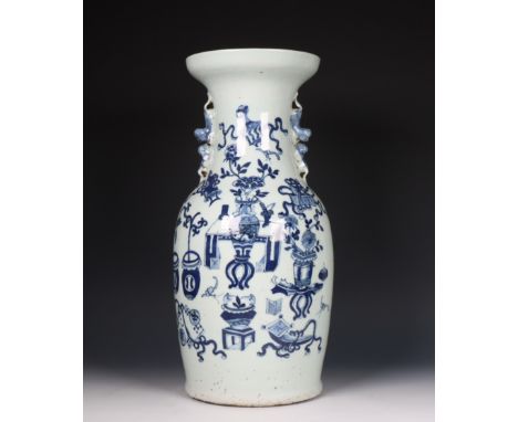 China, blue and white porcelain vase, 19th century, decorated with antiquities, applied with twin lion handles (crack to base