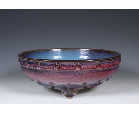 China, junyao-glazed pottery censer, 19th-20th century, raised on tripod feet and modelled after a bronze example, the exteri