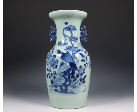 China, celadon-ground blue and white vase, ca. 1900, the baluster vase decorated with a bird perched on a rock in a flower ga