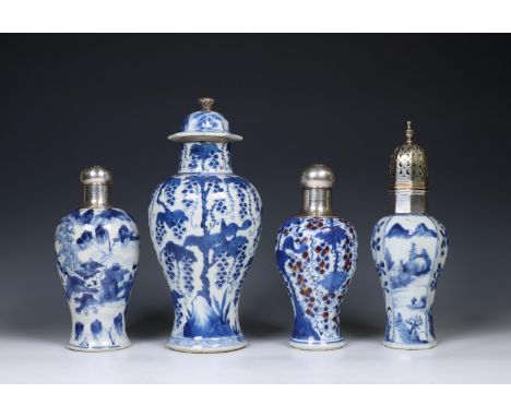 China, four silver-mounted blue and white porcelain vases, 18th-19th century, two decorated with river-landscapes and two wit