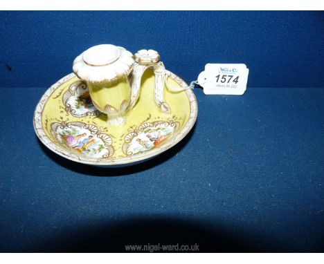 A 19th century Meissen porcelain chamber candlestick on saucer base in yellow with three hand painted reserves of lovers in g
