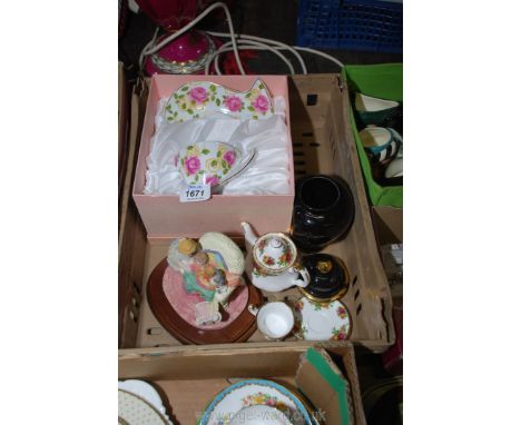 A boxed Leonardo cup &amp; saucer, a miniature Royal Albert teapot with cup &amp; saucer, a black lidded vase, etc.