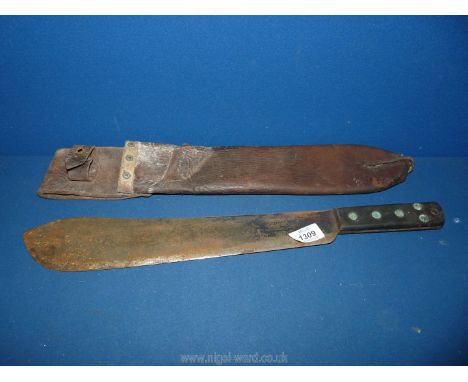 A British WWII Machete blade stamped JJB 1943, with broad arrow detail.