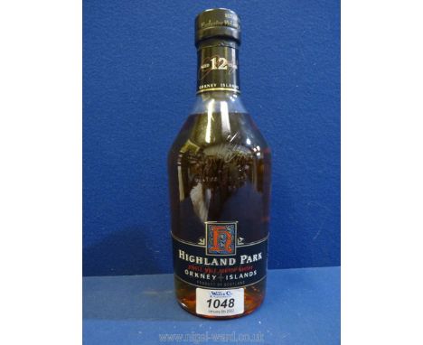 A bottle of Highland Park Orkney Islands 12 years old Single Malt Scotch Whisky.