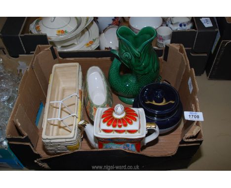 A quantity of china to include; Sylvac flower trough, Dartmouth gurgle jug, etc.