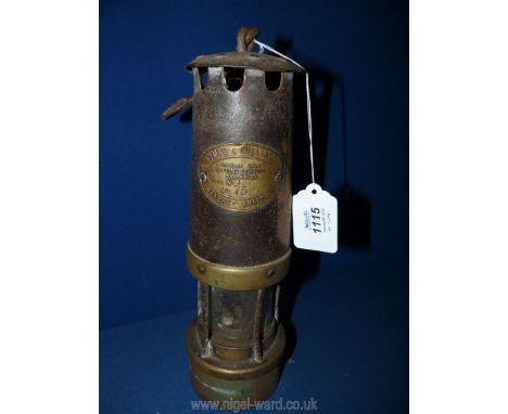 A miner's Lamp by E. Thomas and Williams, Aberdare, no 4, 12 1/2'' tall.