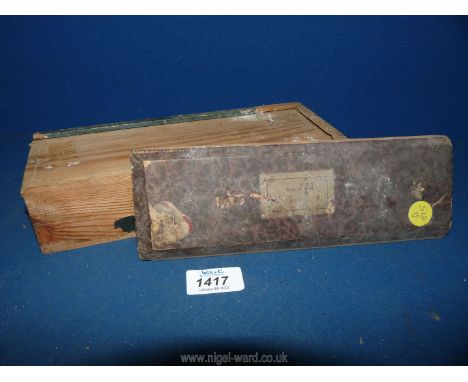 A sliding wooden case containing of a quantity of colourful Magic Lantern slides, each 8 7/8'' x 2 3/8'', various subjects in