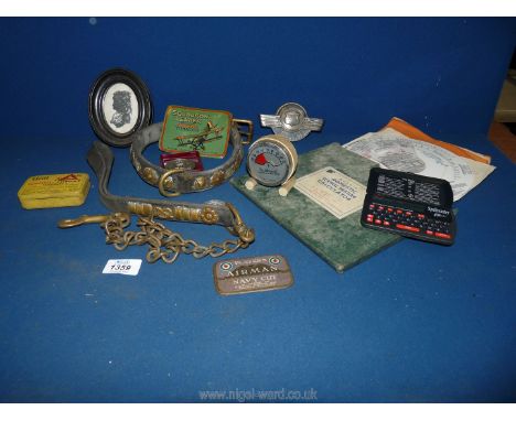 A box of miscellanea to include vintage dog lead, Satchwell thermometer, metal tobacco lids, Spellmaster, Morris car badge, M