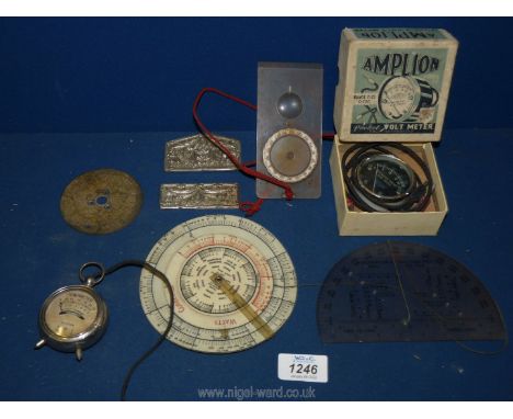 A boxed Pocket Volt Meter 'Amplion', small volt meter, calculator and protractor.