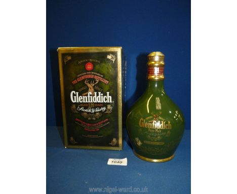 A boxed 'Single Malt Glenfiddich aged 18 years Scotch Whisky' decanter (green box).