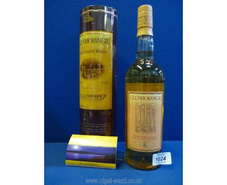 A bottle of Glenmorangie 10 year old Single Highland Malt Scotch Whisky, in presentation tin.