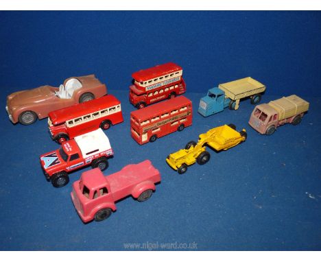 A quantity of play worn toys including Hong-Kong made Triumph TR3, Dinky toys Scammell type articulated lorry, Lesney earth s