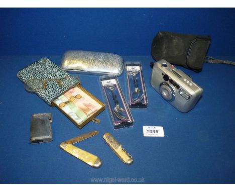 A Nexia 230ixz Fujifilm Camera and case, two Royal Yacht Britannia souvenir spoons, Ronson lighter, penknives, cased set of r