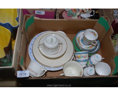 A quantity of Royal Doulton and Crown Staffordshire tea and coffee ware including cups and saucers, Wedgwood green saucer etc