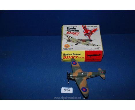 A boxed Meccano Dinky model 719 Spitfire MKII with operating instructions.