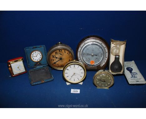 A quantity of Clocks including Westclox 'Big Ben' alarm clocks, Stirling travelling clock, horseshoe shaped barometer present