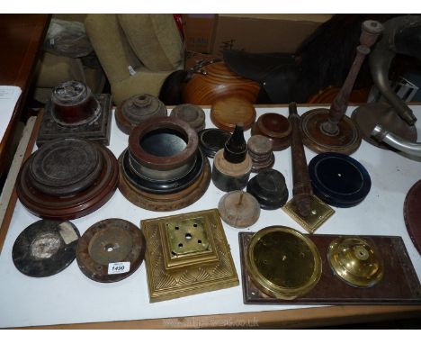 A quantity of mainly turned wooden plinths, three brass finished plinths and a turned wood table lamp base.