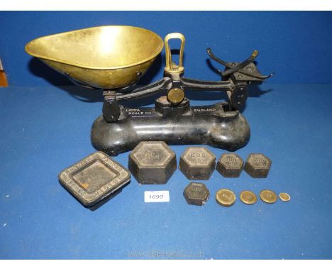A set of Libra weighing Scales with weights, (lacking small tray)