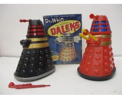 Two Marx Toys Dr Who BBC TV The Mysterious Daleks, battery operated, 6 1/2" h, boxed and another in red 