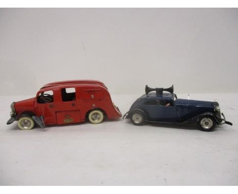 Two Minic tinplate clockwork toy vehicles to include a fire-engine and a police car 