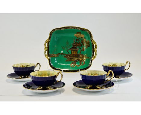 Aynsley Bone China Four Cups And Saucers, Cobalt Blue And Gilt, The Interior With Transfer Printed Fruit. Together With A Nor