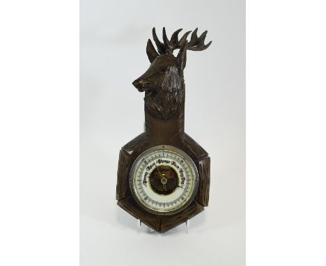 Small Carved Barometer surmounted with a head of a reindeer. 