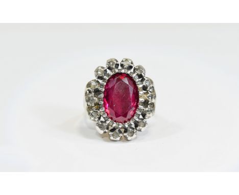 Antique - Unusual Silver and Gold Oval Shaped Ruby Coloured Stone Set Dress Ring. The Central Ruby Coloured Stone Surrounded 