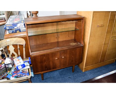 Display Cabinet Mid Century wood cabinet, bottom cupboard with two doors, top section featured glazed sliding doors and glass