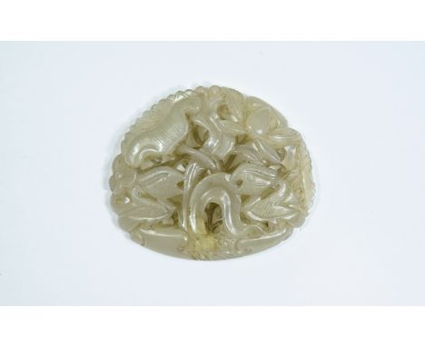 A Pierced Chinese Jade Beli Plaque. 25.9 grams. 1.75 Inches Diameter & 2 Inches. High. 