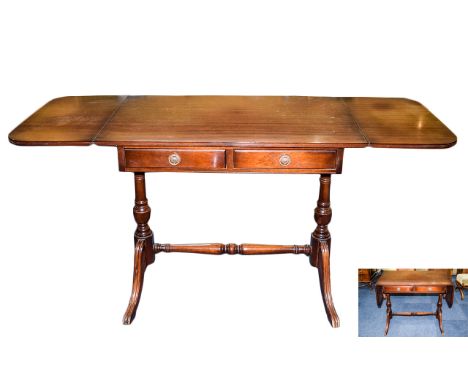 Early 20th Century Mahogany Sofa Table with Two Drawers and Two Drop Leaf Ends, Turned Column Legs, The Sides Joined by a Tur