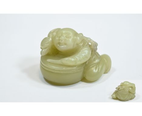 Chinese Antique Jade Carving of a Boy and a Drum. 38.9 grams. 1.5 Inches wide. 