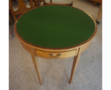 A George III Style Mahogany Fold Over Card Table, the fold over top enclosing a green felt lined interior, above a single dra