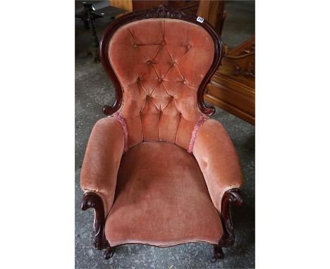 A Victorian Style Spoon Back Armchair, Upholstered in later pink button back velour, 104cm high
