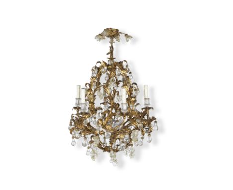 Lustre de style Louis XV à six bras de lumières en tôle dorée, XXe siècleA Louis XV style gilt-tôle six-light chandelier, 20t