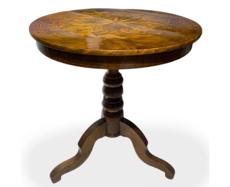 Round table in light walnut, nineteenth century. Inlaid floor in the wind rose. H CM 73, diameter 71 cm