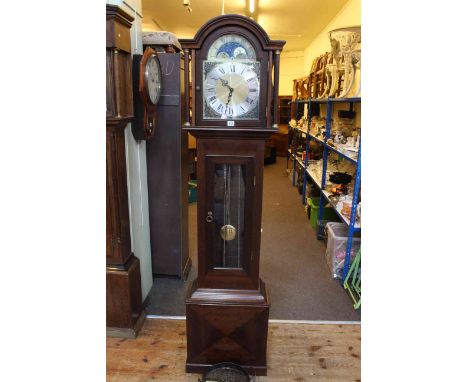 Modern triple weight longcase clock having moon phase dial.