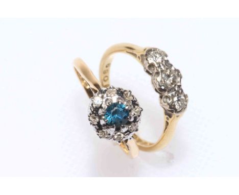 18 carat gold three stone diamond ring, size J/K, and 18 carat gold, sapphire and diamond ring, size L (2).