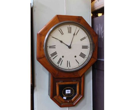 Stained wood wall clock.