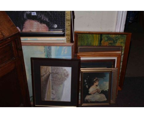 Collection of prints, photos, mirror and military jacket.