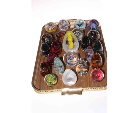 Collection of twenty three glass paperweights, mostly Caithness and Wedgwood.