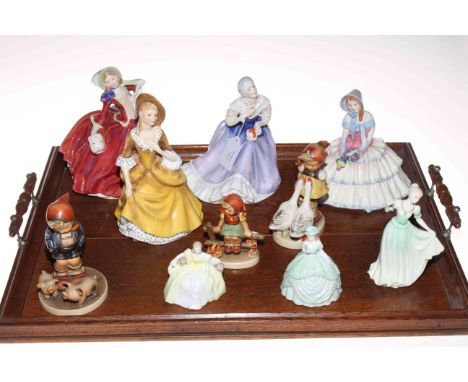 Four Royal Doulton figures including Happy Anniversary, three small Coalport ladies and three Hummel figures (10).