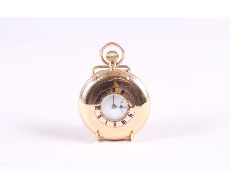 A 9ct gold cased half hunter pocket watch with white enamel dial and Roman numeralsAdditional info:Inner dust cover has no in