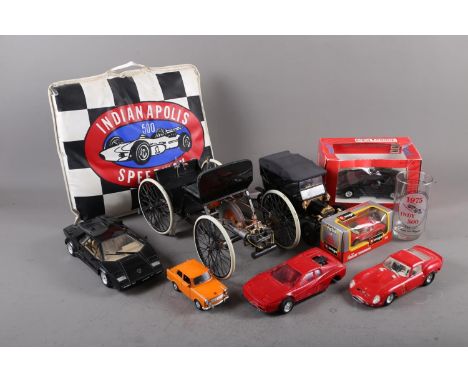 Two die-cast models of early Ford cars, two Tonka models of Lamborghini cars, five smaller model cars, an Indianapolis 500 se