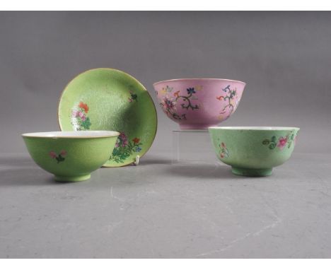 A Chinese bowl with floral scrolled decoration on a pink enamelled ground and seal mark to base, 5 3/4" dia x 2 3/4" high, tw