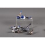 Two Royal Copenhagen wrens (1504) (one restored), a pair of wagtails (1507), two titmice (410 and