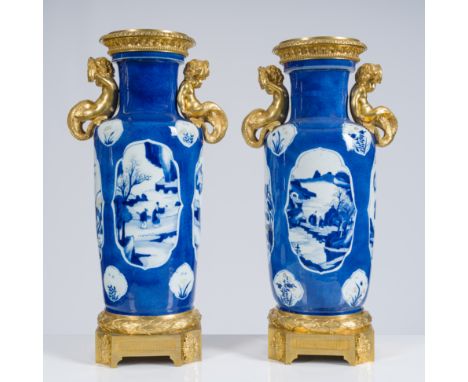 A pair of Chinese blue and white, copper-red and powder-blue rouleau vases with gilt bronze mounts, KangxiH 55 - 54 cm