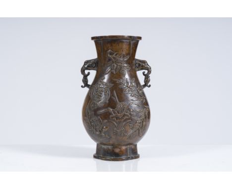 A Chinese bronze 'sanduo' vase with elephant head handles, 18th C.H 24 cm Provenance: - Ex-collection Baron Beyens (Napoléon 