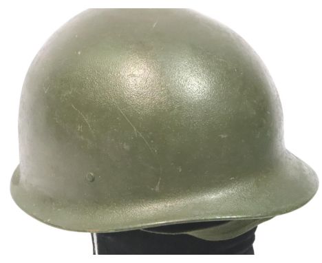 Vietnam War period American helmet with liner and chin strap. P&amp;P Group 2 (£18+VAT for the first lot and £3+VAT for subse