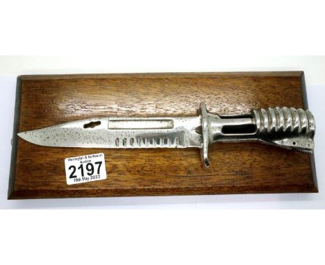 Chromed bayonet mounted on an oak panel. P&amp;P Group 2 (£18+VAT for the first lot and £3+VAT for subsequent lots) 